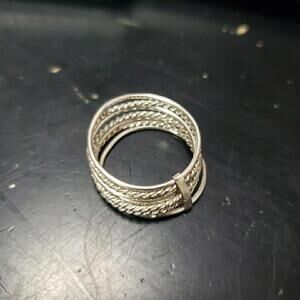 Sterling 925 Stacked 7 Rings Bound Together Sz 7.5 weighs 2.72 grams